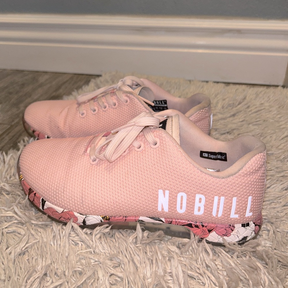 Selling NOBULL (Athletic) shoes. women’s size 8. Light pink with floral soles.